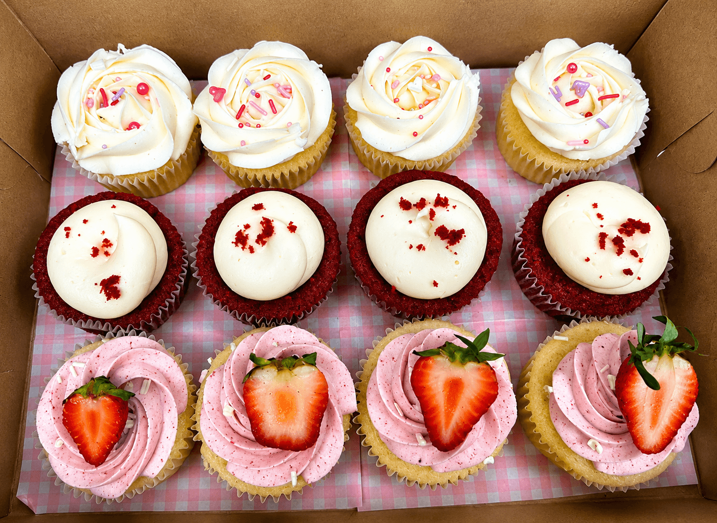 A box of Frosted Bakery cupcakes